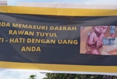 Ini di Jember, Ada Spanduk: Anda Memasuki Daerah Rawan Tuyul...