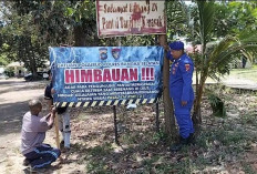 Satpolairud Polres Basel Pasang Spanduk Imbauan di Pantai Tanjung Kerasak