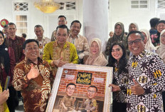 Malam Ramah Tamah Sertijab Wako Kapolresta Beri Cendera Mata Karikatur