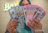 Rupiah Menguat, BI Naikkan Suku Bunga